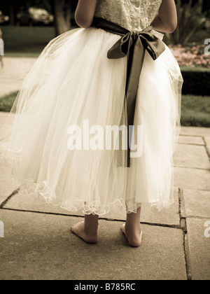 flower girl at wedding, detail of dress Stock Photo