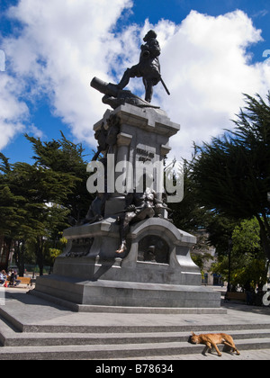 Statue of Fernando de Magellanes and yellow dog in Punta Arenas, Chile, South America Stock Photo