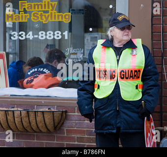 Female school crossing guard Stock Photo