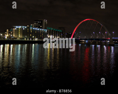 Clyde Arc bridge over the river Clyde and nearby hotel in Glasgow, Scotland Stock Photo