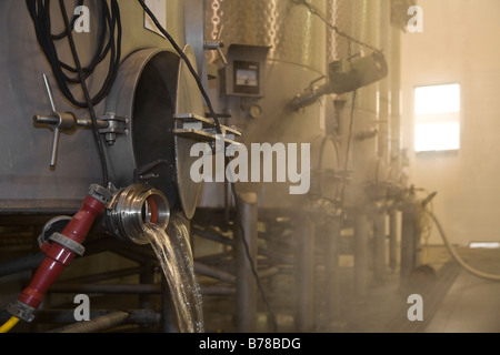 STAINLESS STEEL TANKS are cleaned in preparation for wine making at JOULLIAN VINEYARDS CARMEL VALLEY CALIFORNIA Stock Photo