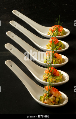 "Apéro", Avocado crayfish salad on porcelain spoons, Haute Cuisine, Labaroche, Alsace, France, Europe Stock Photo