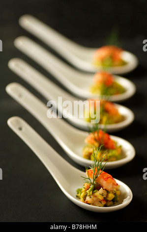 "Apéro", Avocado crayfish salad on porcelain spoons, Haute Cuisine, Labaroche, Alsace, France, Europe Stock Photo