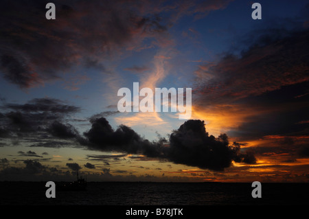 Atmospheric clouds over atoll, Laguna Resort, The Maldives, Indian Ocean Stock Photo