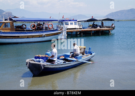 Seafood vendors, boats on the river, river delta near Kaunos, Dalyan in the Mugla Province, Turkey Stock Photo