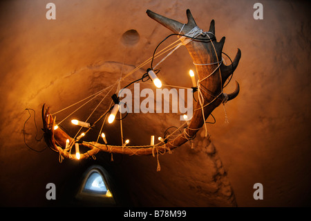 Caribou-antlers as lamp in igloo-hotel, Snow Hotel, Kirkenes, Finnmark, Lapland, Norway, Scandinavia, Europe Stock Photo