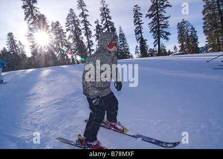 A boy skiing at Sierra at Tahoe ski resort near Lake Tahoe in California Stock Photo