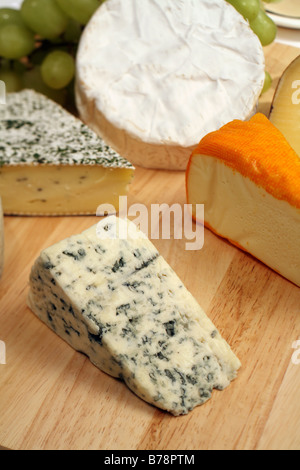 A cheeseboard,Danish blue to the front,with a selection of gourmet cheeses Stock Photo