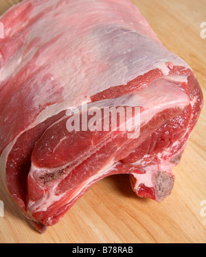 Top view of a rack of raw lamb on a chopping board. Stock Photo