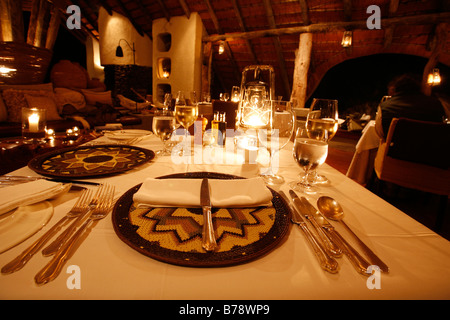 Table setting in the dining room of the Singita Boulders Lodge Stock Photo
