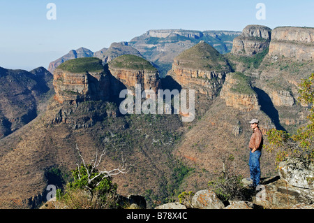 Man in front of rock formation Three Rondavels, Blyde River Canyon, Mpumalanga, South Africa, Africa Stock Photo