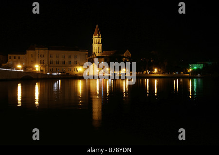 Night shot, reflection of lights in water, church tower, steeple, Cathedral of St. Laurence, Trogir, Croatia, Europe Stock Photo