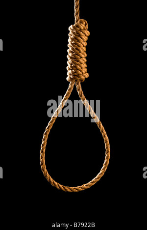 An execution or suicide noose isolated on black and backlit for a dark mood Stock Photo