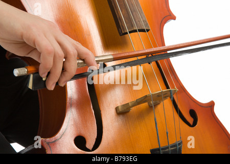 Close up musician hands with cello Stock Photo