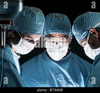 medical team performing surgery Stock Photo