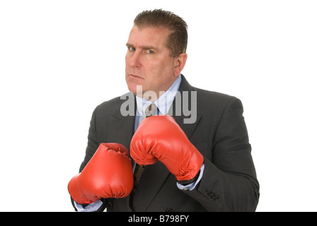 A businessman ready to fight Isolated on white for use as any business inference Stock Photo