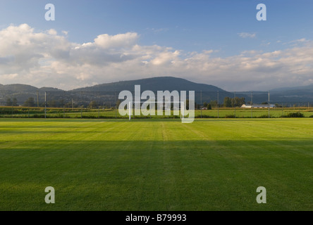 empty goal post at soccer field in a rural setting. Stock Photo