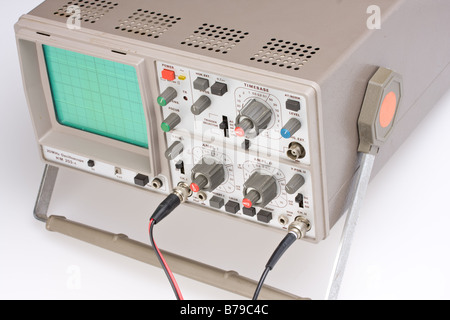 analogue oscilloscope on grey background Stock Photo