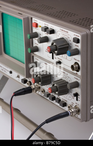 analogue oscilloscope on grey background Stock Photo