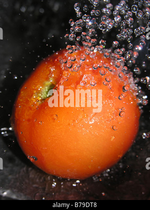 Freshly washed tomato Stock Photo
