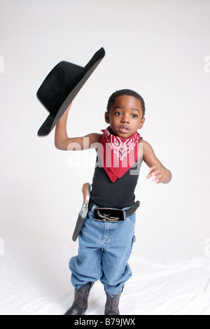 African American boy in cowboy outfit, with bandanna and rope Stock Photo -  Alamy