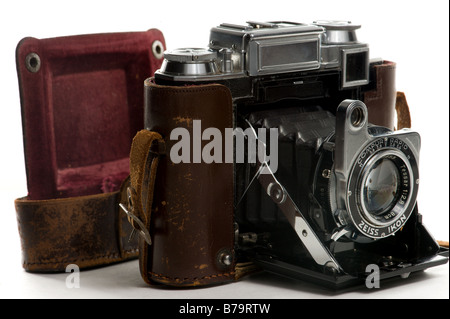 Old fold out Zeiss Camera partially inside its original leather case. Stock Photo