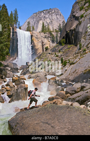 A man hiking in Yosemite National Park by Vernal Falls in California Stock Photo