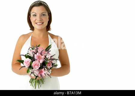 Portrait Of Bride Holding Bouquet Of Flowers Stock Photo