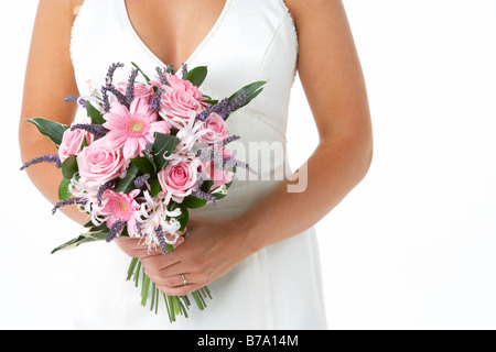 Bride Holding Bouquet Of Flowers Stock Photo
