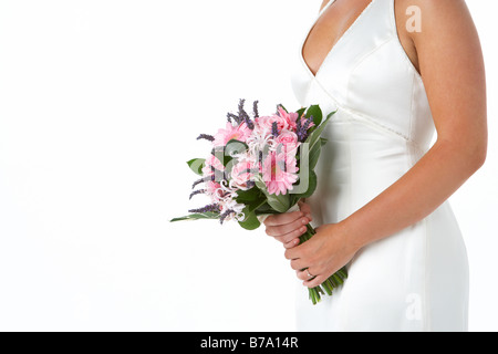 Bride Holding Bouquet Of Flowers Stock Photo