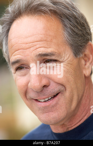 Portrait Of Middle Aged Man Smiling Stock Photo