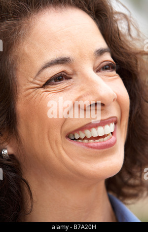 Portrait Of Middle Aged Woman Smiling Stock Photo