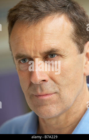 Middle Aged Man In Contemplation Stock Photo