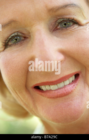 Middle Aged Woman Smiling At The Camera Stock Photo