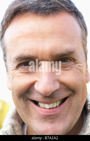 Middle Aged Man Smiling At The Camera Stock Photo