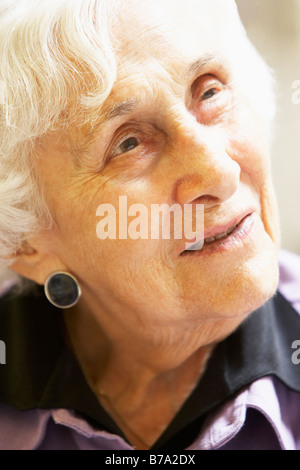 Portrait Of Senior Woman Looking Thoughtful Stock Photo