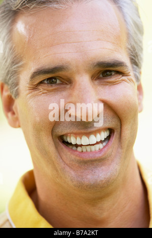 Portrait Of Middle Aged Man Smiling At The Camera Stock Photo
