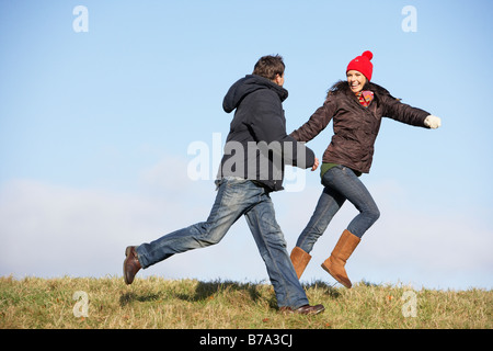 Couple Running In The Park Stock Photo