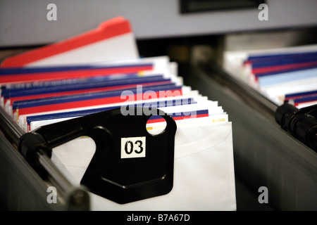 Letters in the machine that sorts the letters into the right order according to route of the mailman, Regensburg distribution c Stock Photo