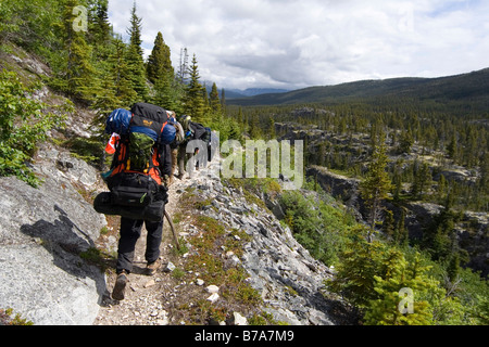Climbing the Chilkoot Pass during the Klondike gold rush, Alaska USA in ...