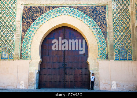 Teenager in front of Bab EI Mansour in Meknes, Morocco, Africa Stock Photo