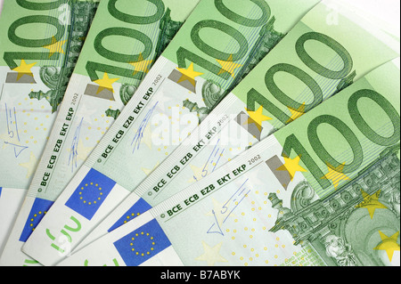 Close-up of 100 Euro banknotes isolated on a background. Close-up high ...