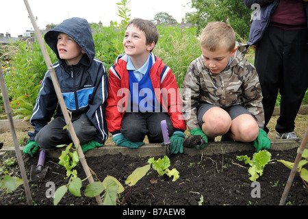 Children visit a local allotment project to learn about gardening and the environment Stock Photo