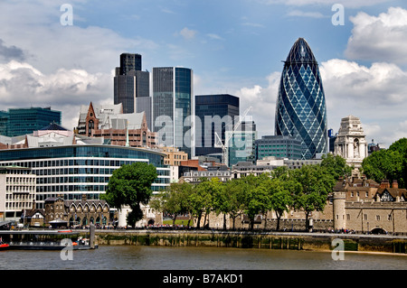 Skyline Gherkin financial bank commercial centre district riverfront river Thames Mary Axe Swiss Re tower of London skyline Stock Photo