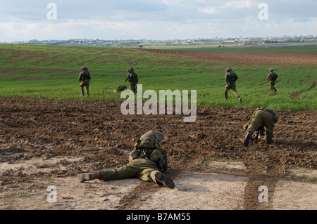 Israeli soldiers from the 35th Brigade also known as the Paratroopers Infantry Brigade taking part in a drill at the border with Gaza Strip. Israel Stock Photo