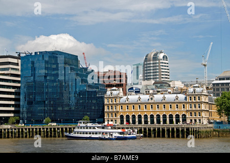 Skyline Gherkin financial bank commercial centre district riverfront river Thames Mary Axe Swiss Re tower of London skyline Stock Photo