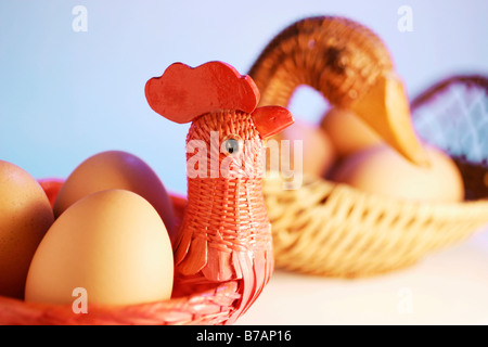 Eggs in baskets Stock Photo