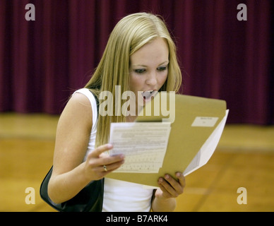 A girl reading her GCSE results at school in Shropshire can't hide her delight Stock Photo