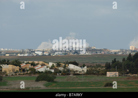 View across Kibbutz Kfar Aza of an Israeli air strike on Hammas positions in a residential area in northern Gaza Strip Stock Photo