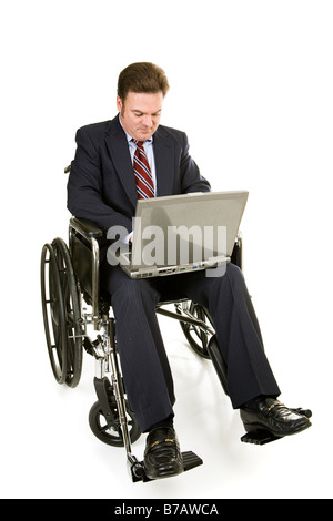 Disabled businessman in wheelchair working on his laptop Full body isolated on white Stock Photo